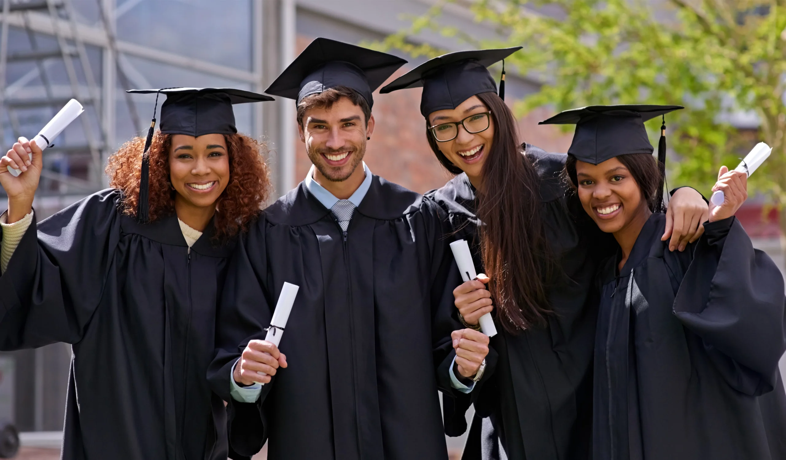 diplomas-in-diversity-shot-of-a-diverse-group-of-2022-10-05-00-00-15-utc - Copy